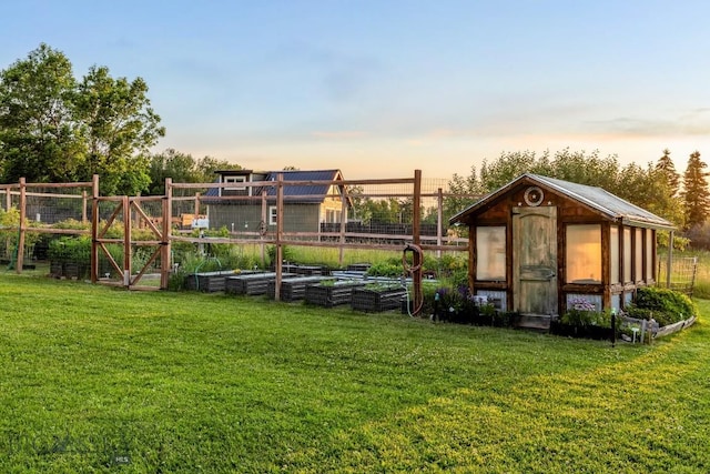 12977 Cottonwood Rd, Bozeman, MT 59718 - view of yard featuring a garden and an outbuilding