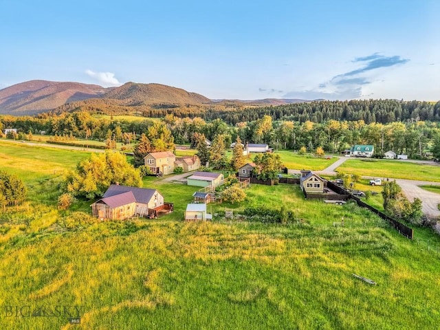 12977 Cottonwood Rd, Bozeman, MT 59718 - drone / aerial view of a heavily wooded area and a mountainous background