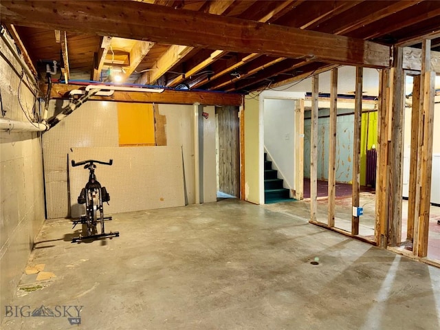 1001 Utah Ave, Butte, MT 59701 - unfinished basement featuring stairway