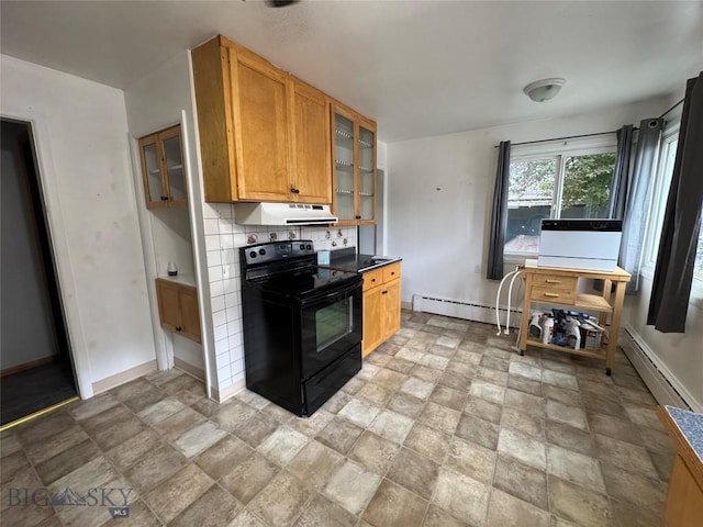 1001 Utah Ave, Butte, MT 59701 - kitchen with electric range, under cabinet range hood, baseboard heating, and stone finish flooring