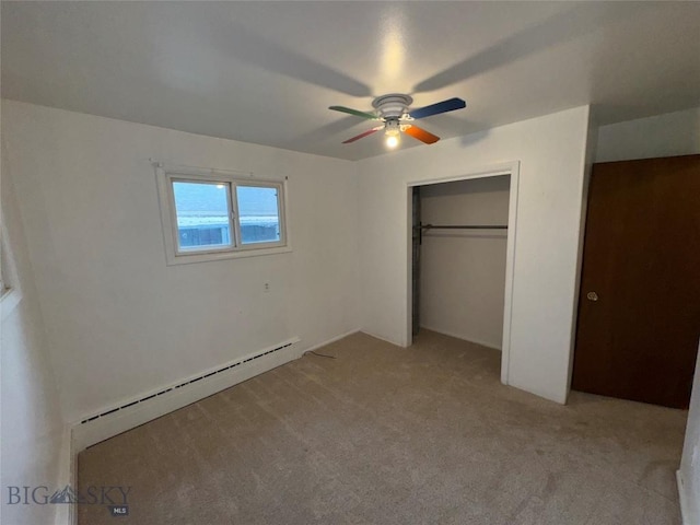 1001 Utah Ave, Butte, MT 59701 - unfurnished bedroom with light colored carpet, baseboard heating, a closet, and ceiling fan