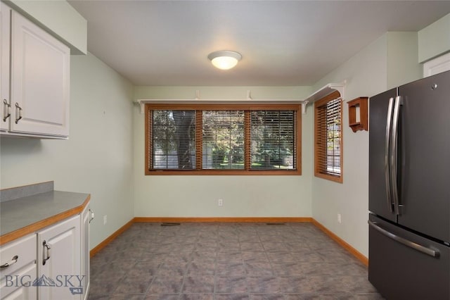 2400 Durston Rd Unit 17, Bozeman, MT 59718 - unfurnished dining area featuring baseboards