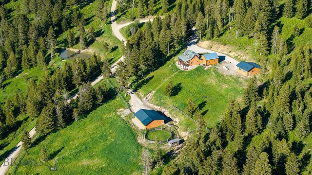185 Peak, Bozeman, MT 59715 - view of property location with a forest