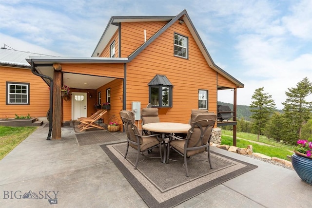 185 Peak, Bozeman, MT 59715 - rear view of property with a patio area and outdoor dining area