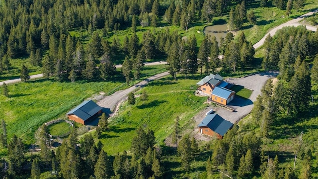 185 Peak, Bozeman, MT 59715 - aerial view of property and surrounding area with a heavily wooded area