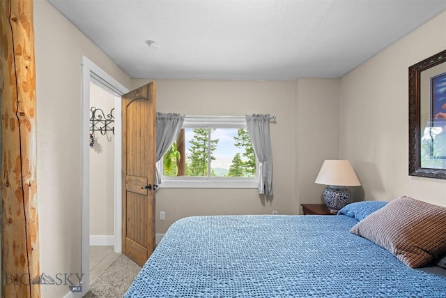185 Peak, Bozeman, MT 59715 - tiled bedroom featuring baseboards