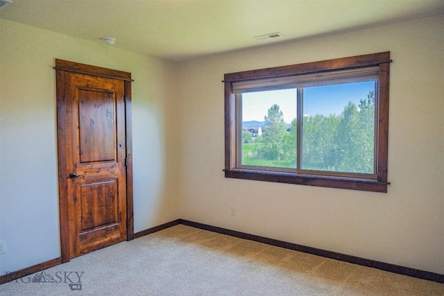 3230 S 26th Ave, Bozeman, MT 59718 - carpeted spare room featuring baseboards and a smoke detector