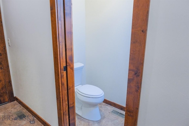 3230 S 26th Ave, Bozeman, MT 59718 - bathroom featuring toilet and tile patterned floors