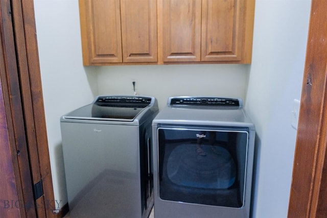 3230 S 26th Ave, Bozeman, MT 59718 - washroom featuring washing machine and clothes dryer and cabinet space