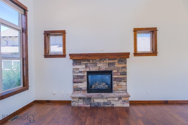 3230 S 26th Ave, Bozeman, MT 59718 - detailed view of wood finished floors and a stone fireplace