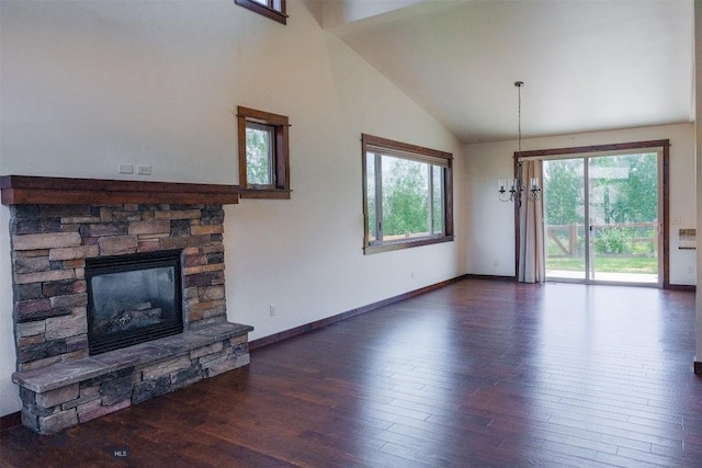 3230 S 26th Ave, Bozeman, MT 59718 - unfurnished living room featuring hardwood / wood-style floors, a fireplace, and high vaulted ceiling