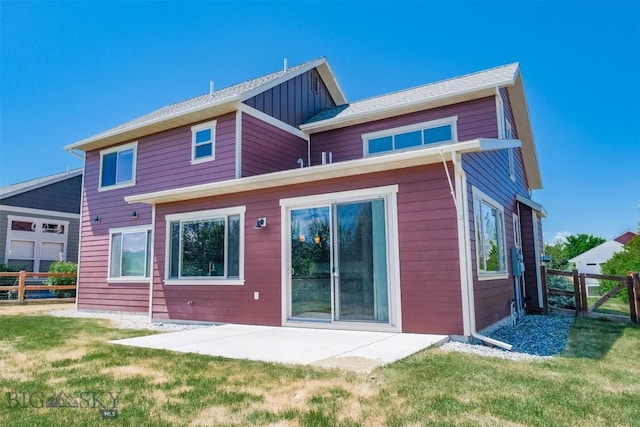 3230 S 26th Ave, Bozeman, MT 59718 - back of house with a patio and board and batten siding
