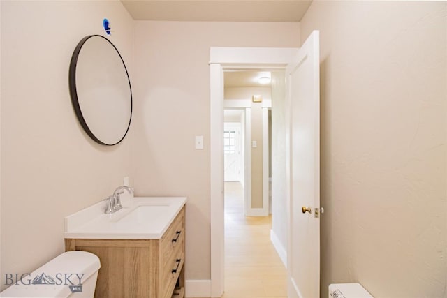 1940 Locust, Butte, MT 59701 - half bathroom featuring toilet and vanity