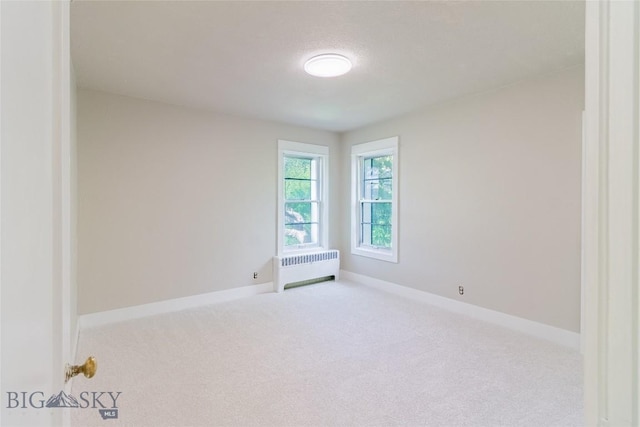 1940 Locust, Butte, MT 59701 - spare room with radiator and carpet floors