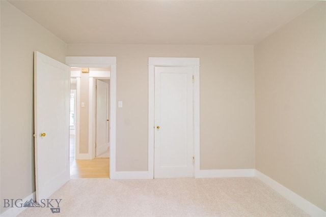 1940 Locust, Butte, MT 59701 - unfurnished bedroom featuring carpet floors and baseboards