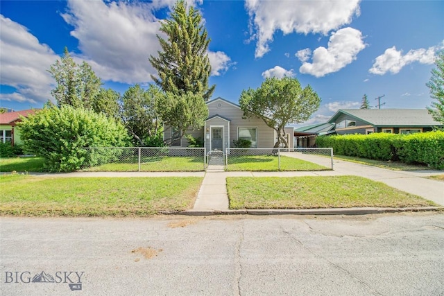 1940 Locust, Butte, MT 59701 - obstructed view of property featuring a fenced front yard, concrete driveway, and a gate