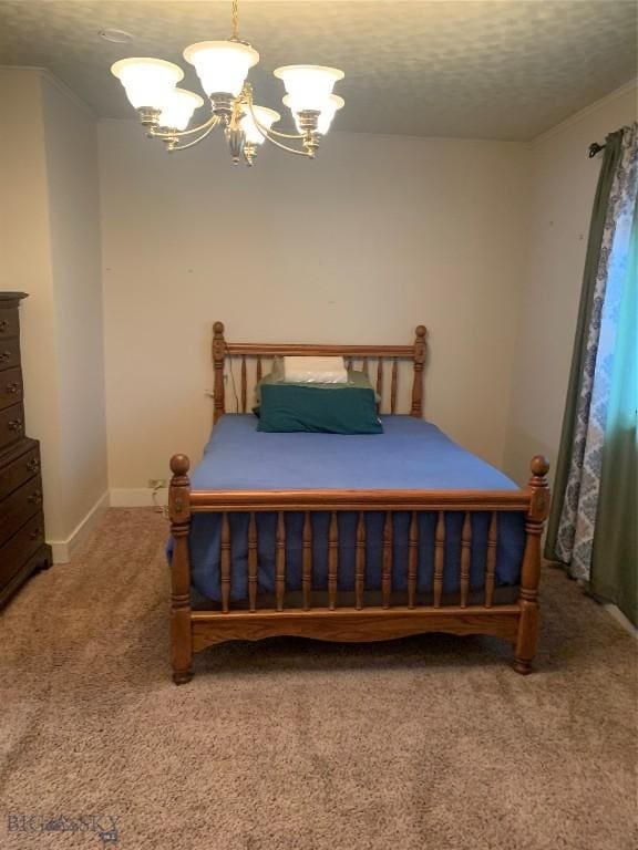 1813 Adams Ave, Butte, MT 59701 - bedroom featuring a chandelier, carpet floors, and a textured ceiling