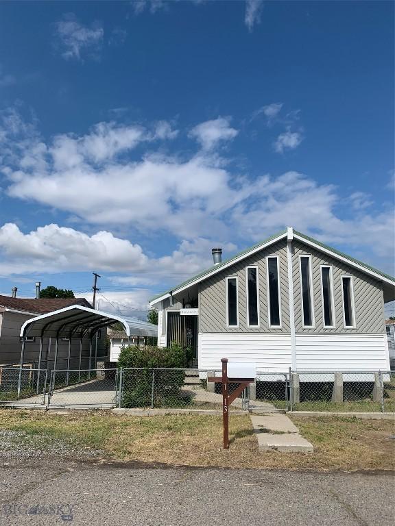 1813 Adams Ave, Butte, MT 59701 - view of side of home with a carport