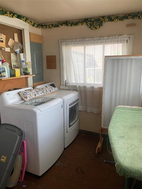 1813 Adams Ave, Butte, MT 59701 - laundry area featuring washer and clothes dryer, electric panel, and carpet flooring