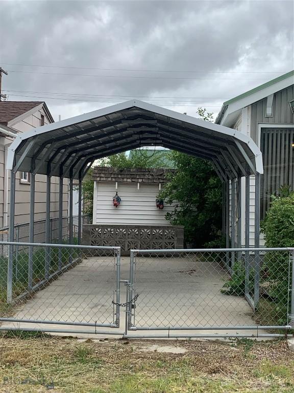 1813 Adams Ave, Butte, MT 59701 - view of vehicle parking with a carport