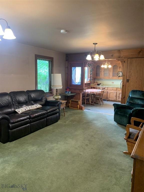 1813 Adams Ave, Butte, MT 59701 - living room with a chandelier and light colored carpet