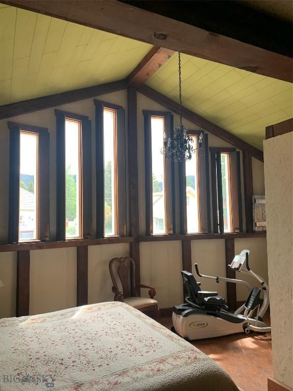 1813 Adams Ave, Butte, MT 59701 - bedroom featuring lofted ceiling, multiple windows, and wooden ceiling