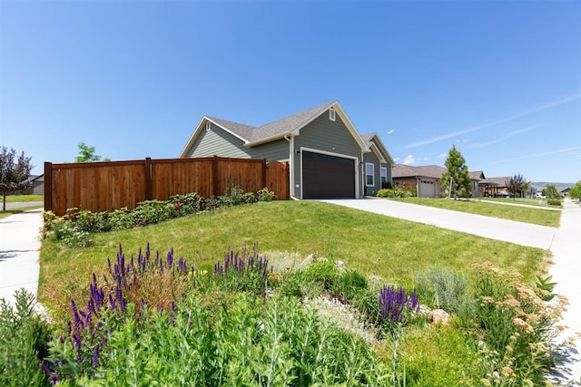 901 Floyd Way, Livingston, MT 59047 - view of home's exterior with a garage and concrete driveway
