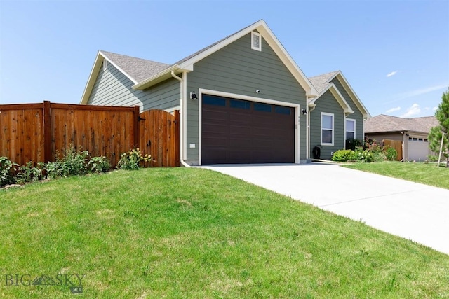 901 Floyd Way, Livingston, MT 59047 - ranch-style home featuring an attached garage and concrete driveway