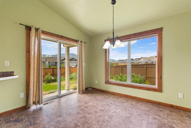 901 Floyd Way, Livingston, MT 59047 - unfurnished dining area with a chandelier and lofted ceiling