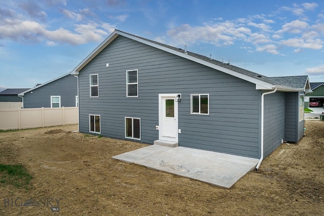 2204 Oriole Dr, Belgrade, MT 59714 - rear view of house featuring a patio