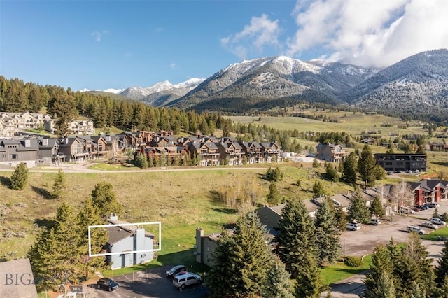 139 Spruce Cone Dr Unit 14, Big Sky, MT 59716 - view of mountain backdrop with nearby suburban area