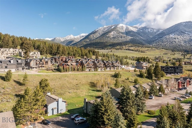 139 Spruce Cone Dr Unit 14, Big Sky, MT 59716 - view of mountain backdrop with nearby suburban area
