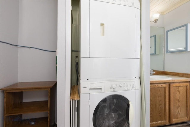 139 Spruce Cone Dr Unit 14, Big Sky, MT 59716 - laundry area with stacked washer and clothes dryer