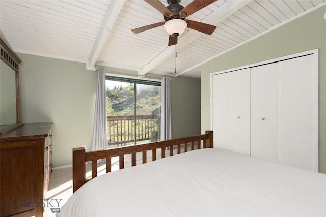 139 Spruce Cone Dr Unit 14, Big Sky, MT 59716 - bedroom with access to outside, carpet flooring, a closet, a ceiling fan, and a wooden ceiling with exposed beams