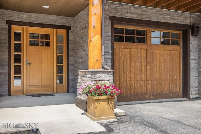 2500 Little Coyote Rd Unit 34, Big Sky, MT 59716 - property entrance with stone siding