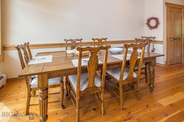 2500 Little Coyote Rd Unit 34, Big Sky, MT 59716 - dining room with light wood-style floors and baseboards
