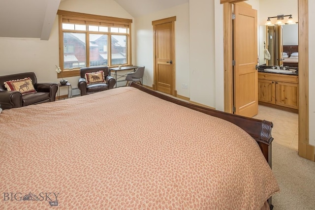 2500 Little Coyote Rd Unit 34, Big Sky, MT 59716 - bedroom with vaulted ceiling and light carpet