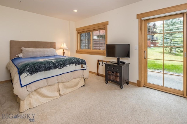 2500 Little Coyote Rd Unit 34, Big Sky, MT 59716 - bedroom with carpet, access to exterior, and recessed lighting