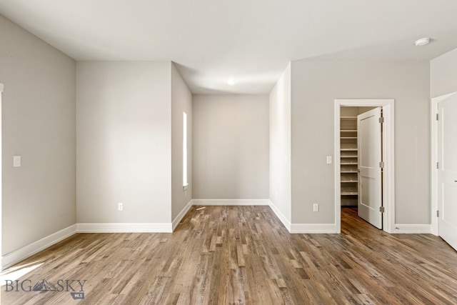 6707 Blackwood Rd Unit C, Bozeman, MT 59715 - spare room with wood finished floors and a smoke detector