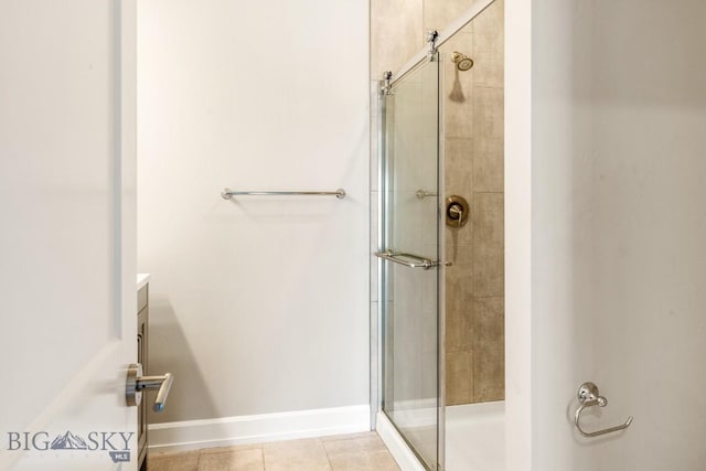 6707 Blackwood Rd Unit C, Bozeman, MT 59715 - full bathroom with a shower stall, tile patterned flooring, and vanity