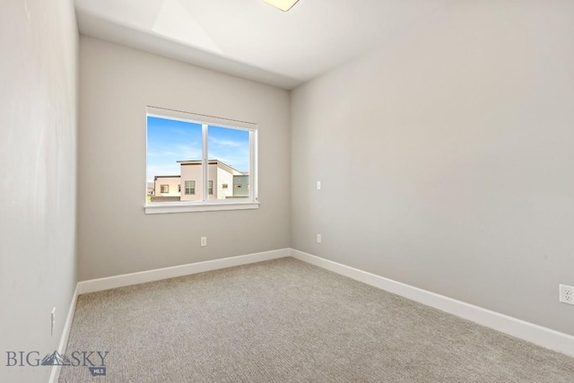 6707 Blackwood Rd Unit C, Bozeman, MT 59715 - spare room featuring carpet floors and baseboards
