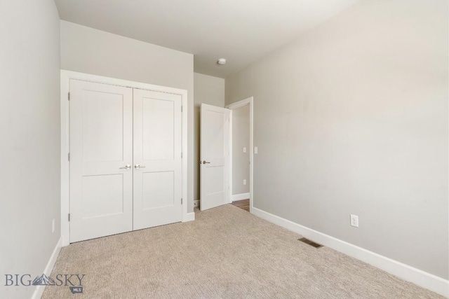 6707 Blackwood Rd Unit C, Bozeman, MT 59715 - unfurnished bedroom with carpet and a closet