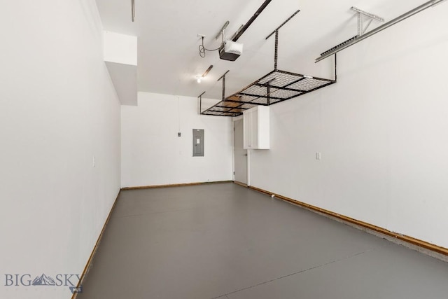 6707 Blackwood Rd Unit C, Bozeman, MT 59715 - garage featuring a garage door opener and electric panel