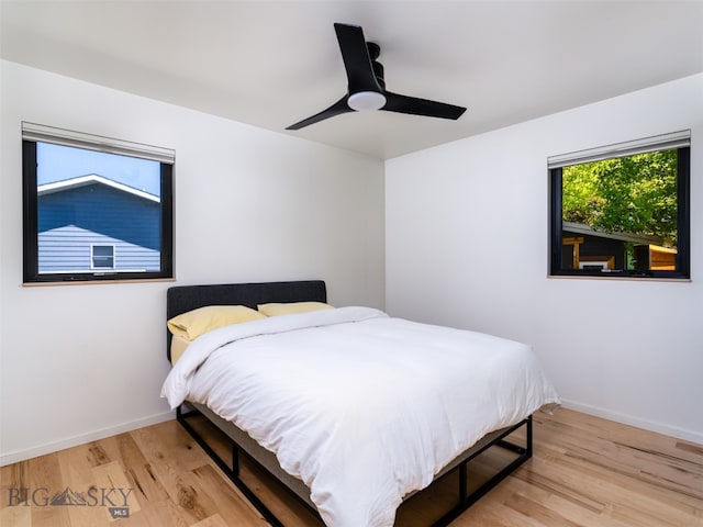 1206 N Cedarview Dr, Bozeman, MT 59715 - bedroom featuring light wood-style floors and a ceiling fan