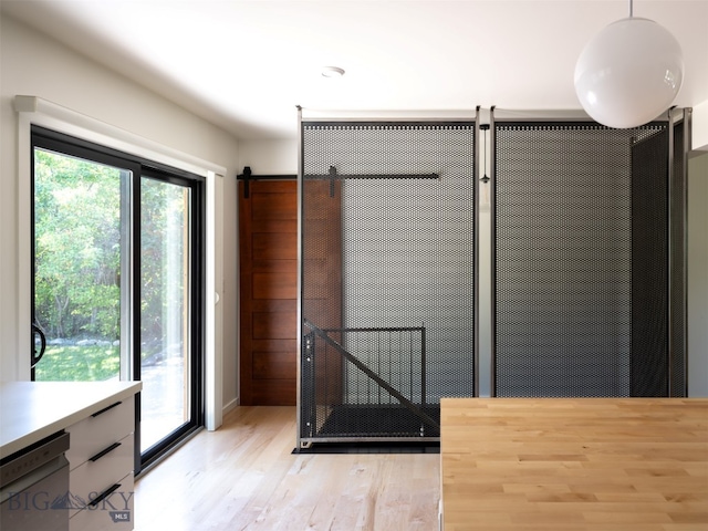 1206 N Cedarview Dr, Bozeman, MT 59715 - interior space featuring light wood-style floors and access to exterior