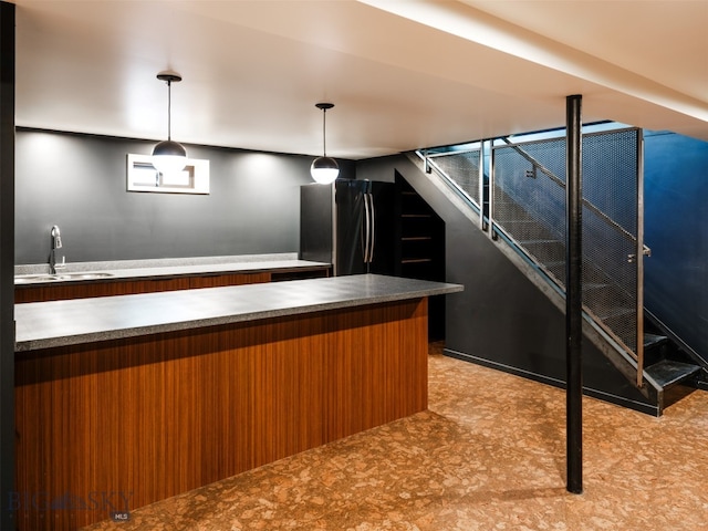 1206 N Cedarview Dr, Bozeman, MT 59715 - bar with freestanding refrigerator, decorative light fixtures, stairway, and light floors