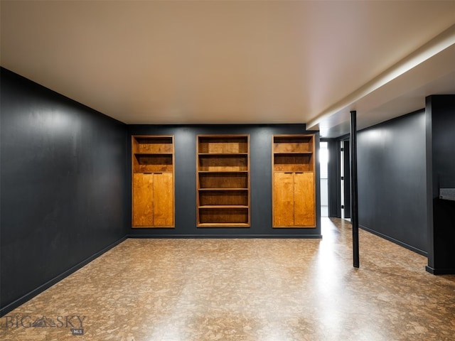 1206 N Cedarview Dr, Bozeman, MT 59715 - finished basement featuring built in shelves and baseboards