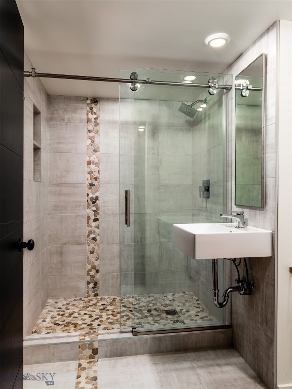 1206 N Cedarview Dr, Bozeman, MT 59715 - full bathroom featuring a sink and a stall shower