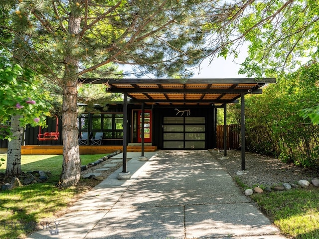 1206 N Cedarview Dr, Bozeman, MT 59715 - view of community with concrete driveway, a carport, and a garage