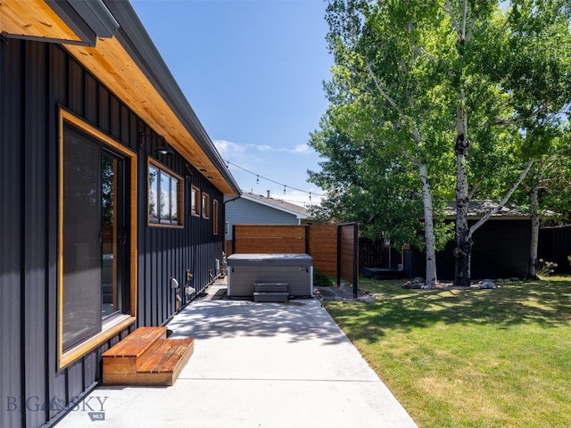 1206 N Cedarview Dr, Bozeman, MT 59715 - fenced backyard featuring a hot tub and a patio